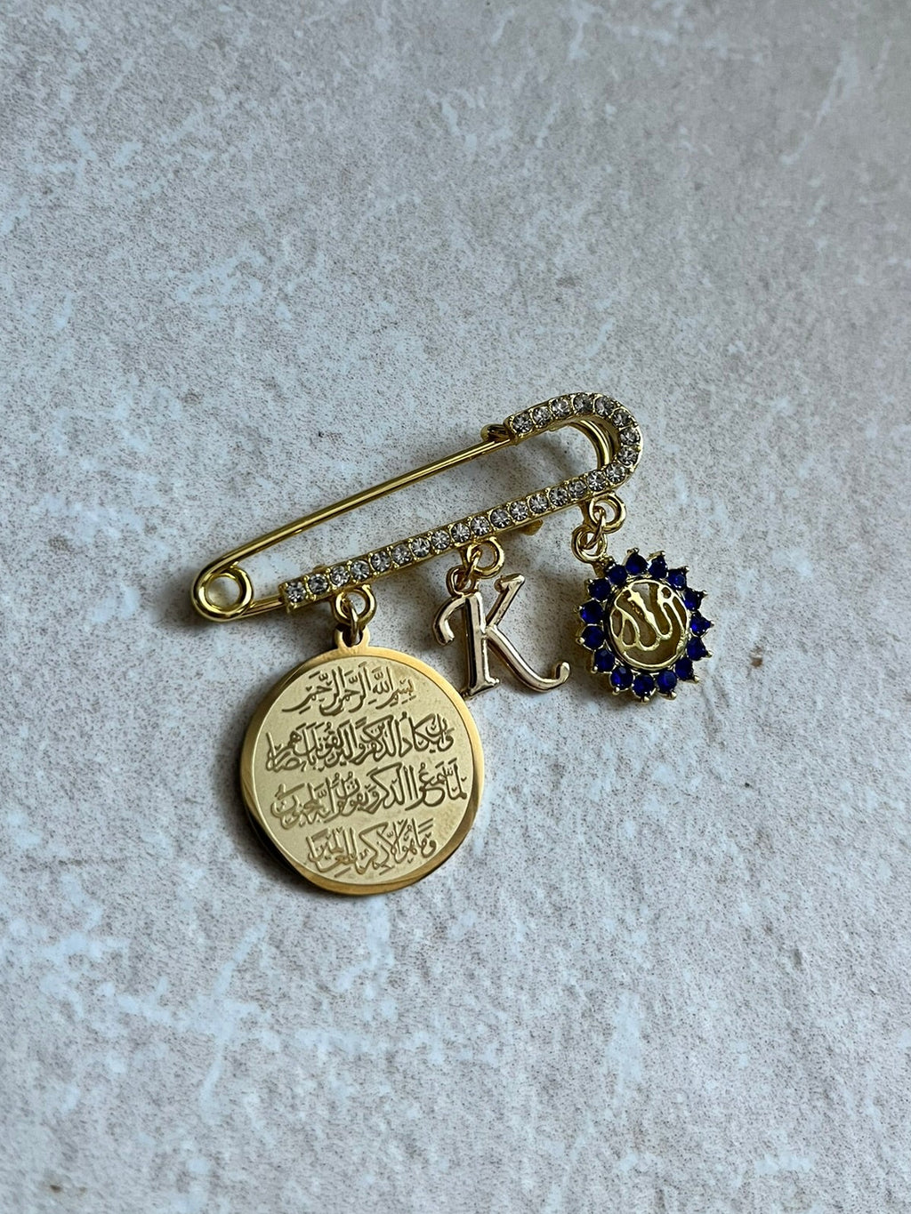 Islamische Babybrosche mit Kristallsteinchen